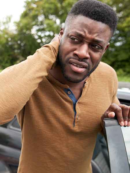 A man who might have neck problems so he needs to find his accident reports online