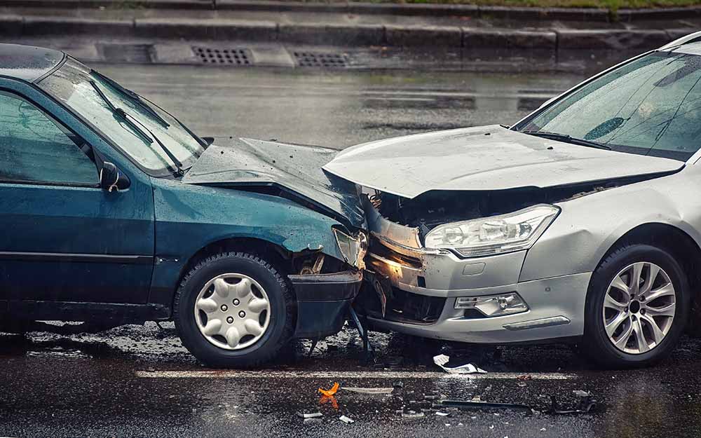 Head on collision between two cars